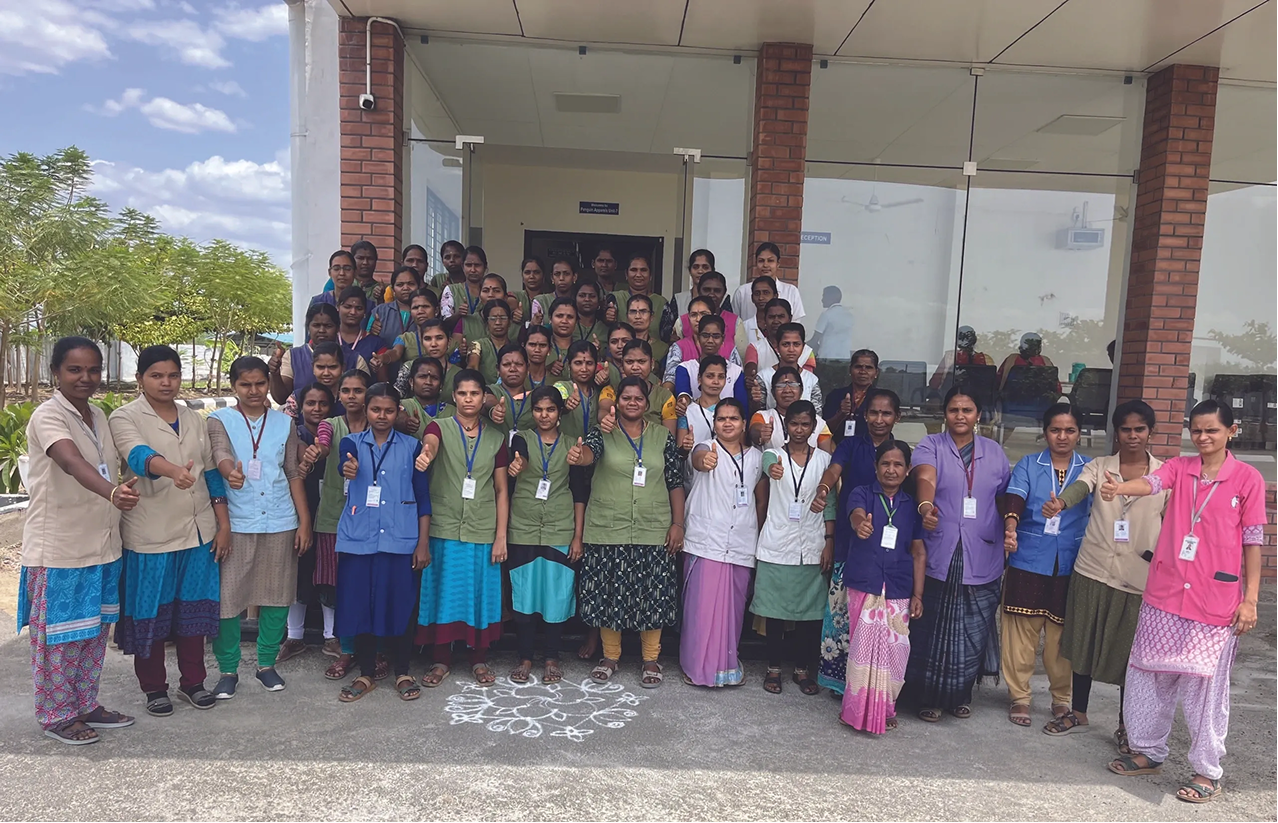 Women working together in a garment manufacturing community